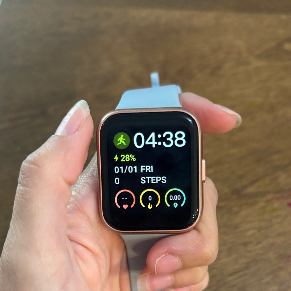 Elegant Smartwatch with Gold Case and White Band